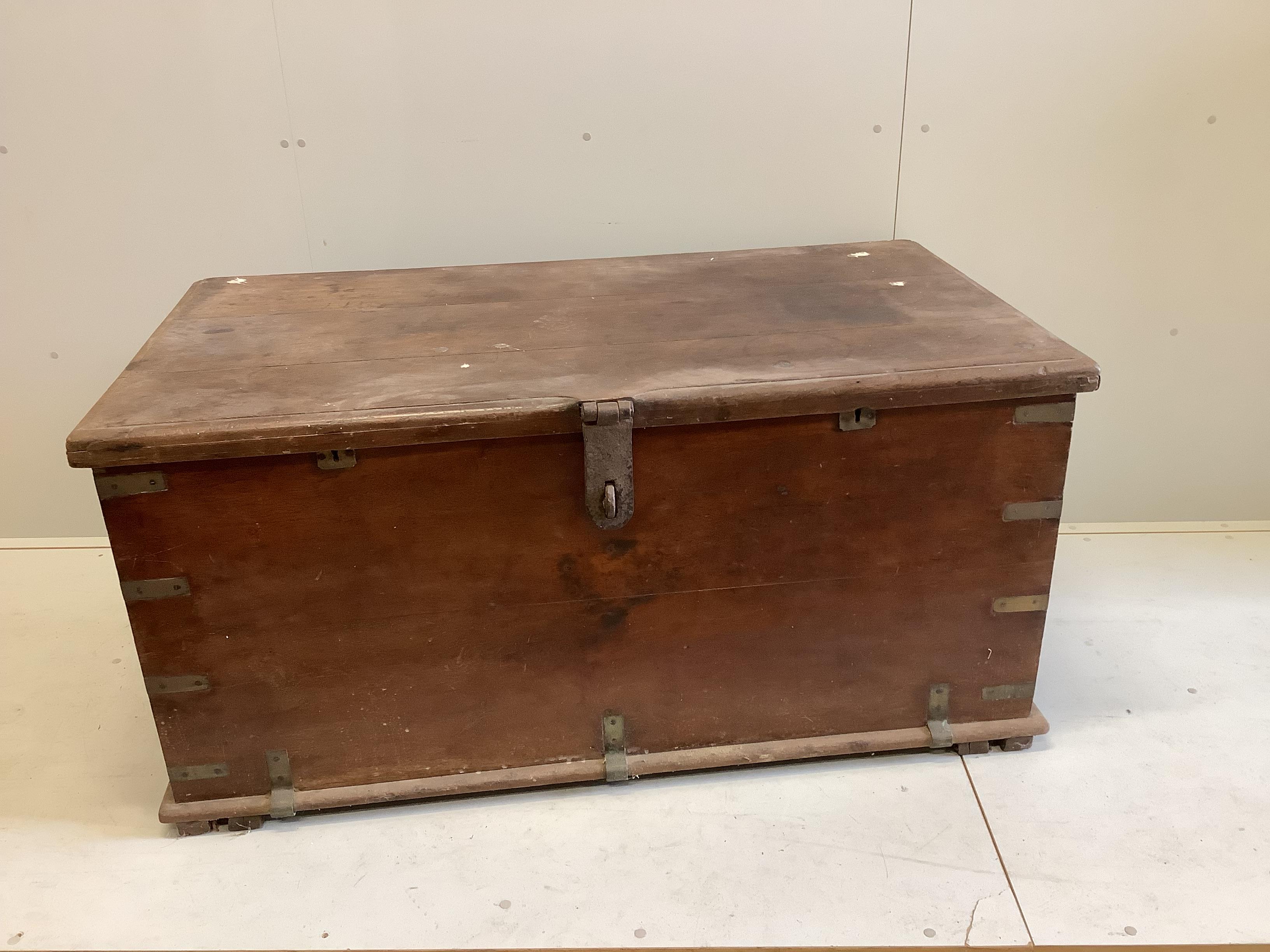 A 19th century brass and iron bound hardwood trunk, width 142cm, depth 76cm, height 69cm